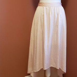 Lauren Conrad rose gold high-low skirt